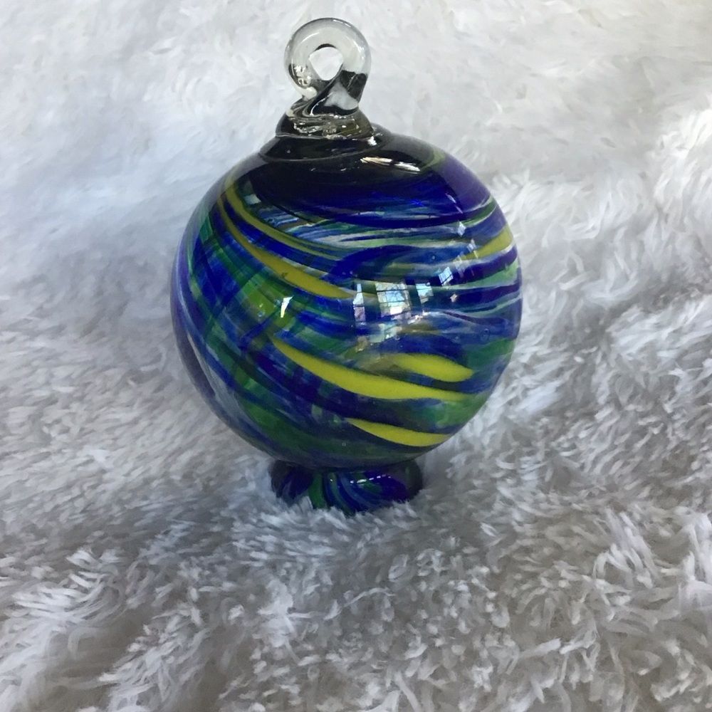 Hand Crafted Glass Orb with Vibrant Blue and Yellow Patterns - Picture 3 of 6